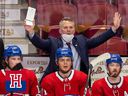 Montreal Canadiens interim head coach Martin St. Louis gesticulates behind the bench.