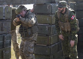 In this 2020 photo, Canadian Armed Forces members help train soldiers from the Armed Forces of Ukraine as part of Operation Unifier.