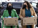 Montreal Mayor Valérie Plante and city councillor Alia Hassan-Cournol, right, drop off boxes of supplies at the Ukrainian Catholic Parish of the Assumption of Blessed Virgin Mary on Wednesday, March 9, 2022.