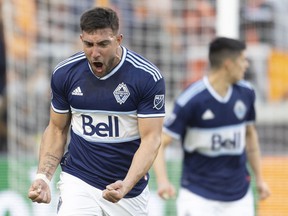 Vancouver Whitecaps FC forward Lucas Cavallini (9) reacts to his goal against the Houston Dynamo FC in the first half at PNC Stadium.  Photo: Thomas Shea-USA Today Sports