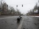 The remains of a missile are seen on the road where at least five people have been killed after Russian forces fired at the main television tower in Kyiv, Ukraine, on March 2, 2022.