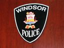 Windsor Police Service insignia on a wall at headquarters.