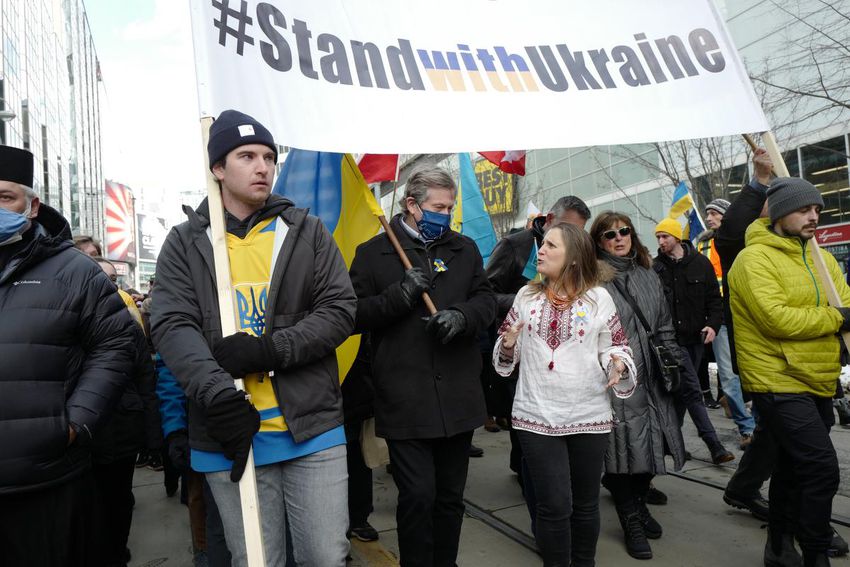 Toronto Mayor John Tory, seen here at a February 2022 rally for Ukraine, has called for a review of a $144-million contract the city awarded to a construction company partly owned by a sanctioned Russian oligarch.