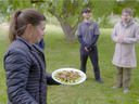 Camosun College archaeologist and anthropology teacher Nicole Kilburn serves up a plate of bugs (yum!) to Adrian Maddaloni and Jaymie Chudiak (right), part of the Nature of Things episode Curb Your Carbon, to be broadcast Jan. 14 at 9 pm on CBC and CBC Gem, and to be hosted by actor Ryan Reynolds.