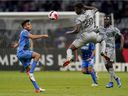 CF Montreal's Ismaël Koné (28) and Carlos Rodriguez of Mexico's Cruz Azul vie for the ball during a CONCACAF Champions League quarter-final soccer match in Mexico City on Wednesday, March 9, 2022.