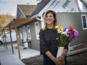 Small is Beautiful.  Sarah Cipkar, a consultant with Cipkar Development, is shown on Friday, Nov. 6, 2020, standing in front of her newly unveiled laneway home — a 430-square-foot house built in the backyard of her home on Bruce Avenue.