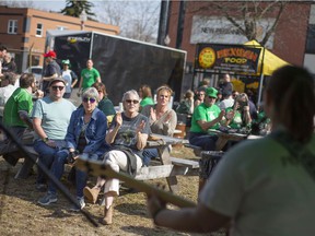 People enjoy the live music while attending the St. Patrick's Day festivities at the new WindsorEats location on Erie Street East, Thursday, March 17, 2022.