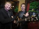 Kevin Shannon, left, and Ted Lamont of the band Paddy Whacked, are pictured March 15, 2018, at O'Maggio's Kildare House, one of their performance stops on St. Patrick's Day on Saturday.