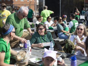 People gather for St. Patrick's Day festivities at the new WindsorEats location on Erie Street East, Thursday, March 17, 2022.
