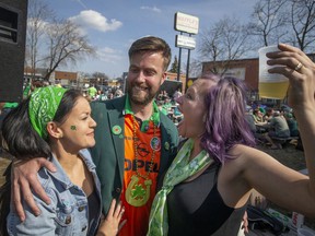 Bridget Fauteux, Danger McCullough, and Margaret McCormick attend the St. Patrick's Day festivities at the new WindsorEats location on Erie Street East, Thursday, March 17, 2022.