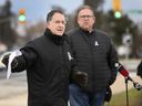 Windsor West MP Brian Masse, left, speaks during a press conference in front of the Stellantis Windsor Assembly Plant with Unifor Local 444 President Dave Cassidy on Monday, December 6, 2021.