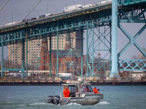 A marine unit with the LaSalle fire department searches the Detroit River for the possible remains of Blair Lyons on March 21, 2022.