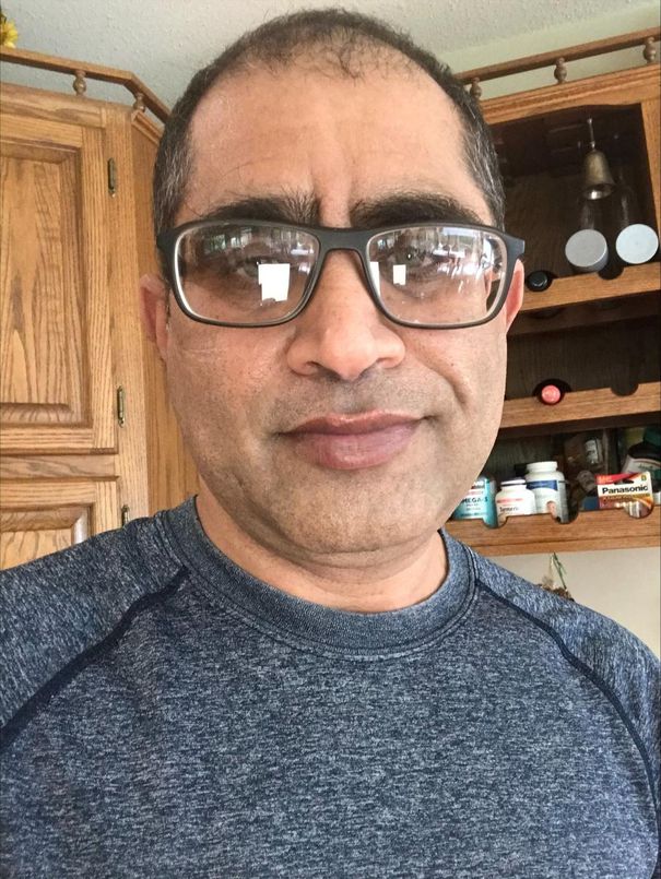 Kishorkumar Ahir was hired by a family in Vancouver as an in-home caregiver for an elderly man in 2018 after paying $7,000 to an immigration consultant to secure him a job.  He said he was later reassigned to work as a laborer at the employer's tire shops even though his work permit restricted him to working as a caregiver only.
