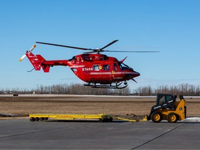 A group of Alberta business and community leaders are airlifted by STARS helicopter to a remote location in Devon where they must raise enough money to secure their flight back to the airport.  Taken on Thursday, March 24, 2022, in Edmonton.