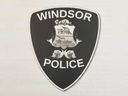 Windsor Police Service insignia on a report cover.