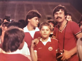 A young Postmedia soccer columnist Derek Van Diest with his father Gustavo at a Canada vs Chile soccer match at Clarke Stadium in Edmonton on July 25, 1984.