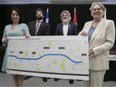 Montreal Mayor Valérie Plante, left, and Quebec Transport Minister Chantal Rouleau, far right, hold the latest map of the Blue Line of the Montreal métro on March 18, 2022, with Canadian Heritage Minister Pablo Rodriguez, right, and STM chairman Éric Alan Caldwell .