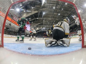 Ottawa 67's forward Vinzenz Rohrer scores his 19th goal of the season and first of two goals in the game against the Kingston Frontenacs at the TD Place arena on Wednesday, March 16, 2022.