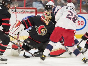 Ottawa Senators goalie Anton Forsberg makes a save on a shot from Columbus Blue Jackets right wing Oliver Bjorkstrand in the first period at the Canadian Tire Center on Wednesday, March 16, 2022.