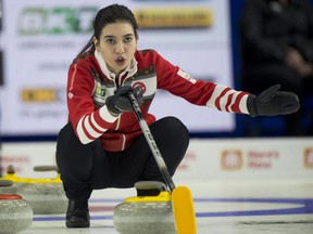 Team Turkey skip Dilsat Yildiz calls a teammate's shot during a game against Canada at the world women's curling championship in Prince George, BC, on March 20, 2022.