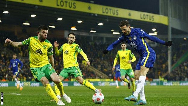 Chelsea's Saul Niguez challenges for the ball with Norwich City's Grant Hanley in the Premier League