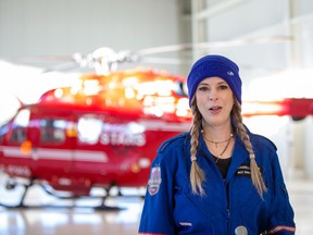 Danielle Woo, General Manager, West Edmonton Mall speaks to the media before being airlifted by STARS helicopter to a remote location in Devon where they must raise enough money to secure their flight back to the airport.  Taken on Thursday, March 24, 2022 in Edmonton.