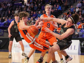 Unity Christian, in orange, defeated Glenlyon Norfolk 89-71 to win the 1A BC Boys Basketball Finals at the Langley Event Center on Saturday, March 13, 2022. Photo: Paul Yates, Vancouver Sports Pictures