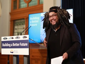 Tsartlip First Nation Chief Don Tom shares a laugh following his speech about the provincial plan to implement the United Nations Declaration on the rights of Indigenous Peoples during a ceremony in the Hall of Honor at the legislature in Victoria on Wednesday, March 30, 2022. Tom is also a vice-president of the Union of BC Indian Chiefs.