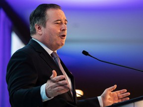 Premier Jason Kenney speaks at the Alberta Municipalities spring leaders caucus at the Edmonton Convention Center on Thursday, March 10, 2022.