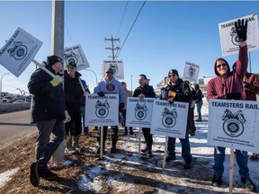 Teamsters Canada Rail Conference members are pictured at a picket line in Edmonton on March 21, 2022.