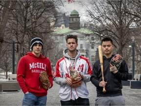 McGill Redbirds baseball players Carlos Vallejos, James Mulvaney and Chester Dixon, right, on the school's campus in Montreal on Monday March 28, 2022. They are upset the school has canceled the baseball program for this season.