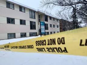 ASIRT is investigating a police shooting that killed two people on Wednesday, Feb. 23, 2022, in Edmonton.  Police tape restricts access to a walk up apartment near 107 Avenue and 105 Street on Thursday, Feb. 24, 2022.