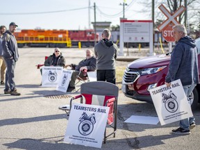 Rail workers strike at the Canadian Pacific Railway Company on Tecumseh Blvd. West, off of Crawford Avenue, on Monday, March 21, 2022.