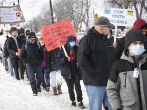 A march in honor of Lucas Gaudet makes its way along Park Ave. on Saturday, March 5, 2022, to denounce violent crimes toward kids and young adults.  Lucas Gaudet was 16 when he was stabbed to death in February.