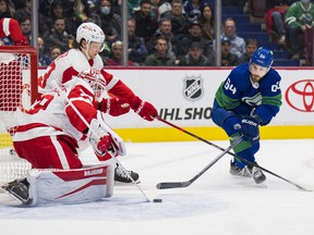 Vancouver Canucks forward Tyler Motte shoots on Detroit Red Wings goalie Alex Nedeljkovic in the first period at Rogers Arena.