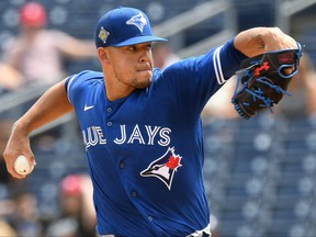 Toronto Blue Jays pitcher Jose Berrios throws a pitch in the first inning of his team's game against the Philadelphia Phillies during spring training at BayCare Ballpark in Clearwater, Fla., on March 23, 2022.