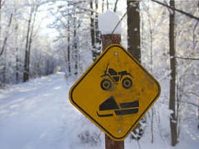 Snowmobiles and ATVs share the same paths in the winter.