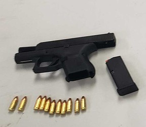 A handgun and ammunition that a suspect attempted to discard during an arrest operation by Windsor police on March 16, 2022.