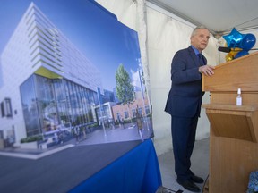 President and Vice-Chancellor of the University of Windsor, Robert Gordon, gives remarks during a press event marking the naming of the new athletic center p the Toldo Lancer Centre, outside the facility on Tuesday, March 29, 2022.