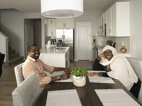 Musah Khalid and Mariam Senusi love their new home by Homes by Avi home in Uplands at Riverview.