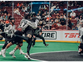 The Vancouver Warriors go to the net during their Jan. 7 National Lacrosse League game against the visiting Colorado Mammoth at Rogers Arena, the first of two games — Colorado won both contests — the teams have played against each other so far this season.