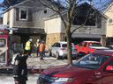 Fire officials at the scene of a blaze on Conestoga Dr. in Brampton that killed two parents and their three children on Monday, March 28, 2022.