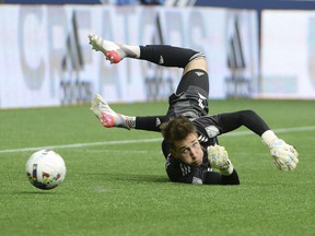 Vancouver Whitecaps goalkeeper Thomas Hasal reaches for a shot on net by the New York City FC during the first half at BC Place on Saturday.  Photo: Anne-Marie Sorvin-USA TODAY Sports