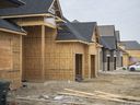 WINDSOR, ONTARIO:.  JANUARY 18, 2022 - Construction of a single detached home in a new housing development east of Huron Church Line Road, is seen on Tuesday, January 18, 2022.