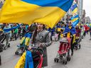 Ukraine supporters marched through the streets of Montreal on Saturday, March 26, 2022. 