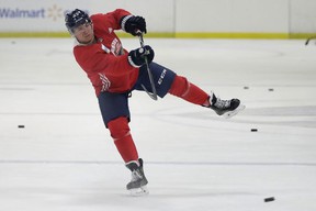Florida Panthers defenseman Brady Keeper takes a shot during his first full NHL hockey training camp at the Panther's training facility in Coral Springs, Fla.