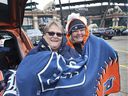 Canadian sisters Mary Ann Gates, left, from LaSalle and Shari Gates from Windsor were dressed for the chilly weather on Thursday, April 4, 2019, at the Detroit Tigers opening day at Comerica Park in Detroit.