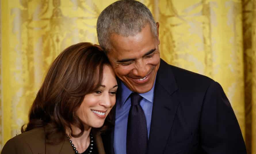Barack Obama hugs Vice President Kamala Harris.