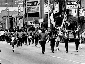 The Marracci Temple Band of Detroit led the parade of bands, marchers and drill teams that participated in the Emancipation parade Monday from Chatham Street to Jackson Park along Ouellette Avenue, Aug. 3, 1975.