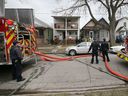 Windsor firefighters respond to a fire at a multi-unit building in the 300 block of McEwan Avenue on March 27, 2022.